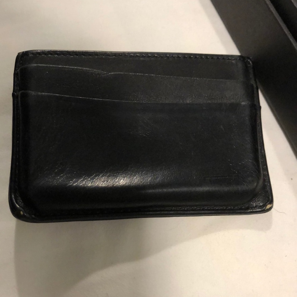 Tumi black leather wallet